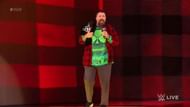 Mick Foley walking out with the title